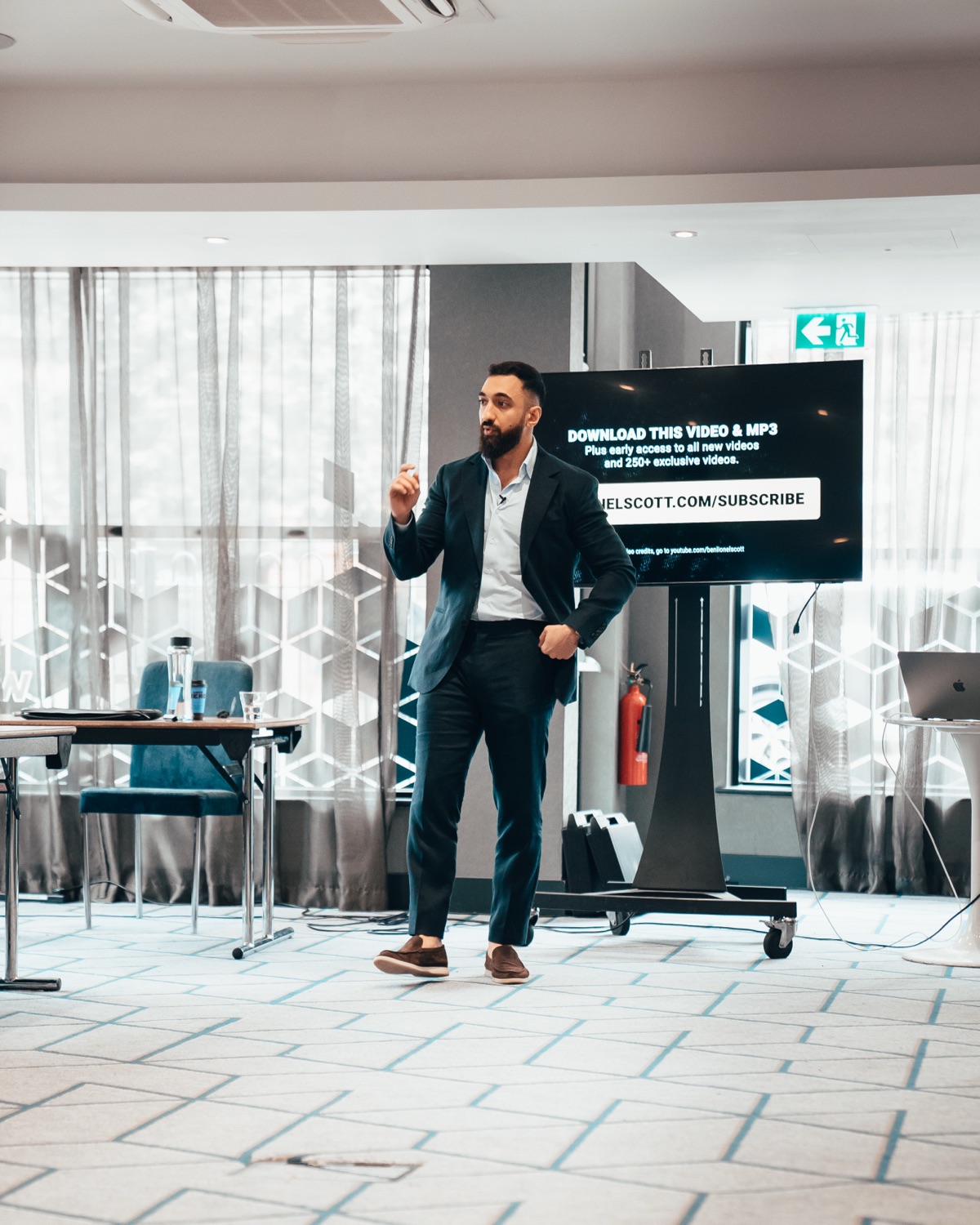 Dr. Mateen Ahmad presenting at a live event